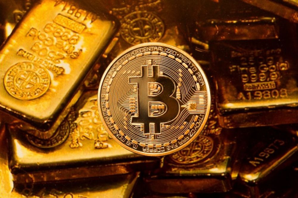 Giá Bitcoin 'bốc đầu' lập đỉnh mới trên 52.000 USD